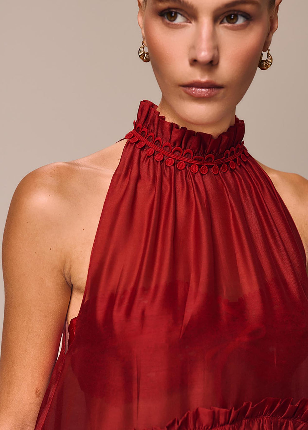 BLUSA ASSIMETRICA COM BABADOS DESIDERIO